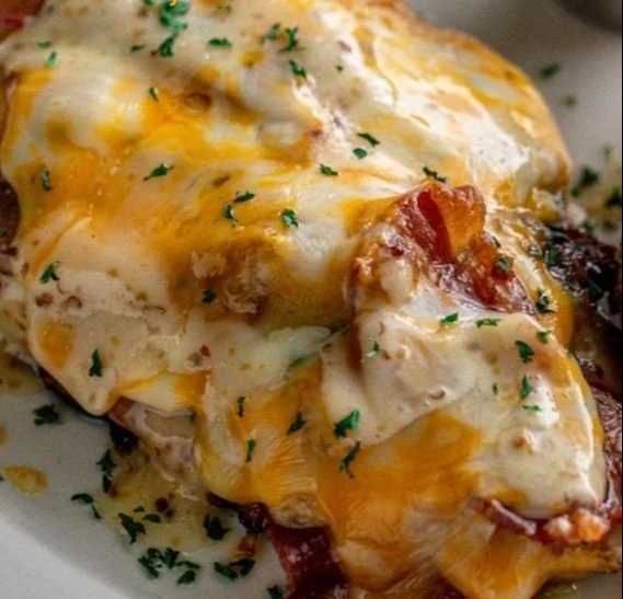 Delicious Alice Springs Chicken on a plate, garnished and ready to serve.