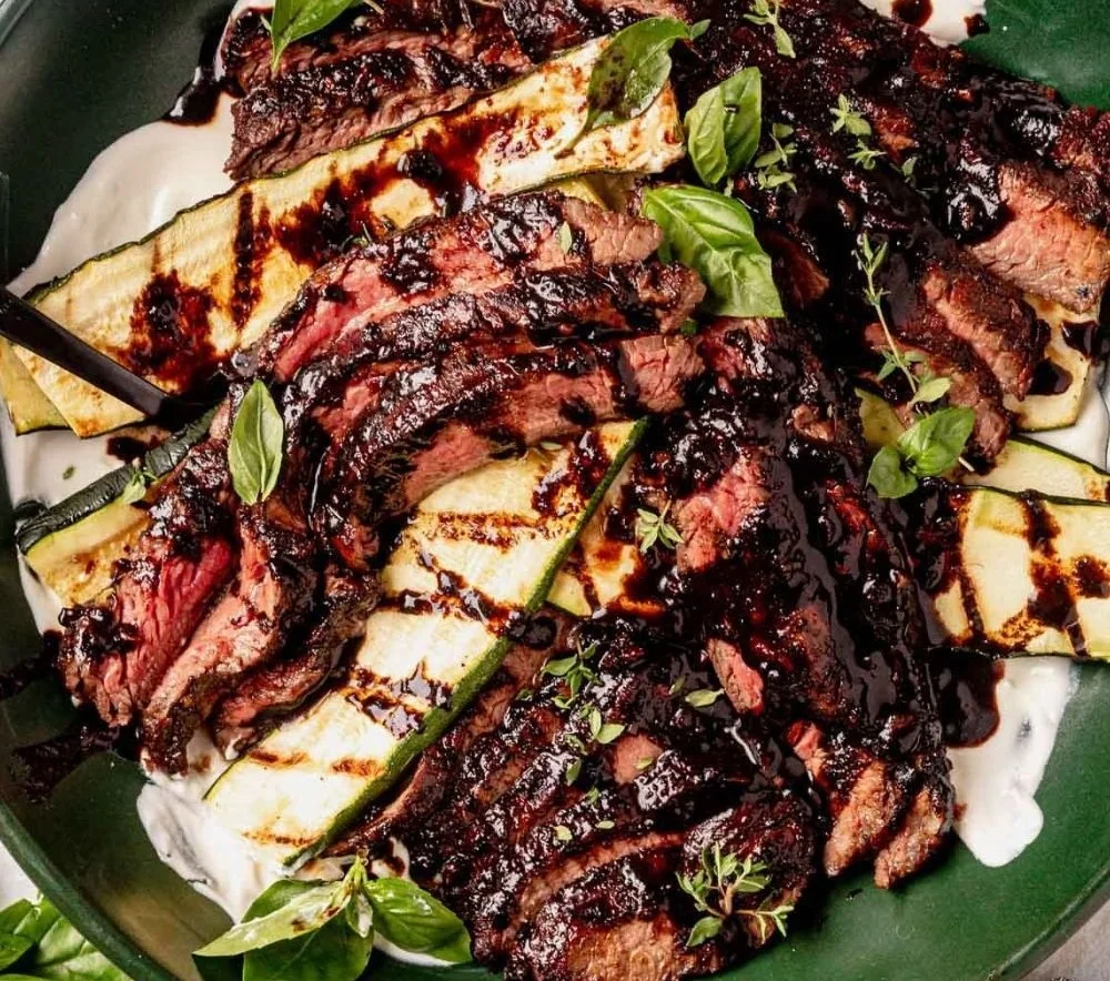 Juicy balsamic flank steak marinated and grilled to perfection