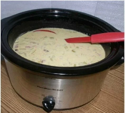 Delicious bowl of best crockpot potato soup with a secret ingredient