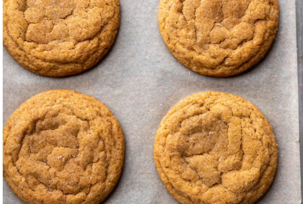 Chewy pumpkin cookies with a golden-brown exterior and fall spices