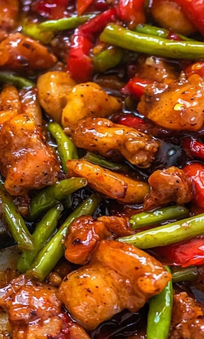 Chicken and green bean stir-fry served in a colorful bowl