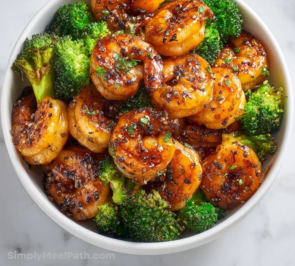 Delicious protein-packed honey garlic shrimp served with vegetables.