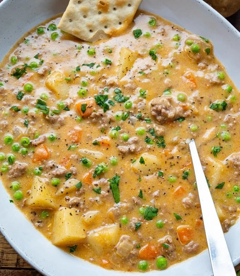 Delicious bowl of Shepherd's Pie Soup topped with fresh herbs