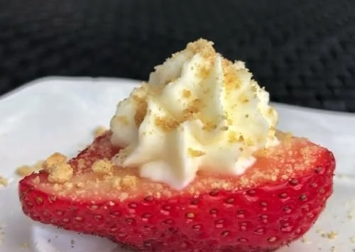 Strawberry cream cheese finger foods presented on a platter for parties