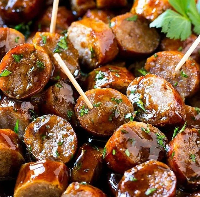 Delicious Beer Brat Bites on a serving platter, perfect for gatherings.
