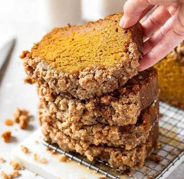 Delicious homemade pumpkin bread with spices and a golden crust.