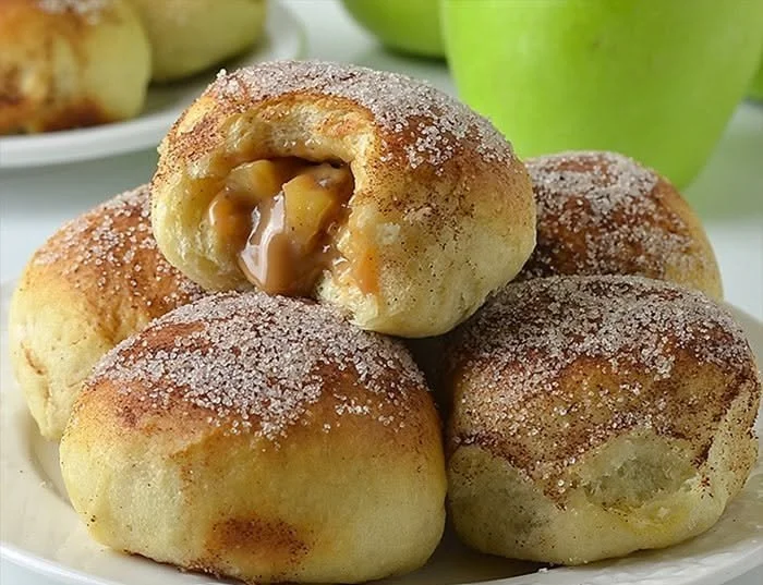 Close-up of delicious caramel apple pie bombs on a plate