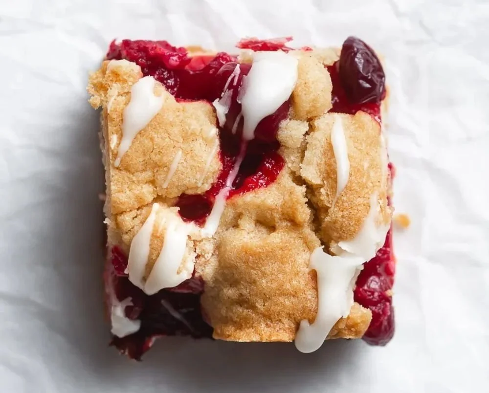 Delicious cranberry crumble bars topped with browned butter blondie crust