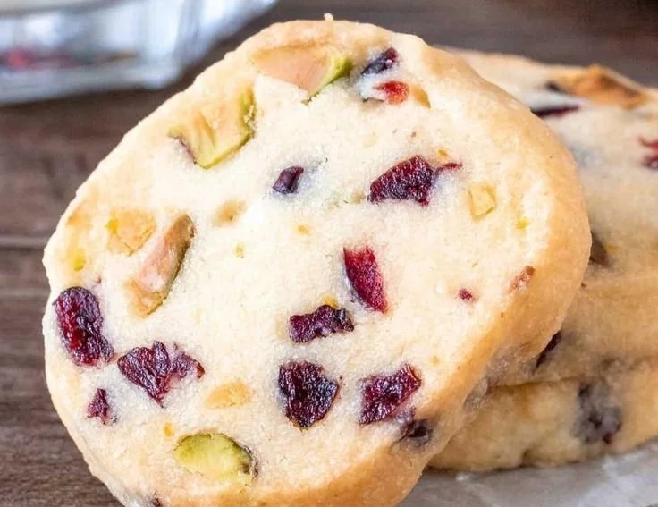 Cranberry Pistachio Shortbread cookies on a plate