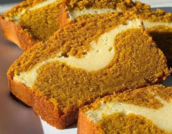 Delicious homemade pumpkin cheesecake bread slice on a plate