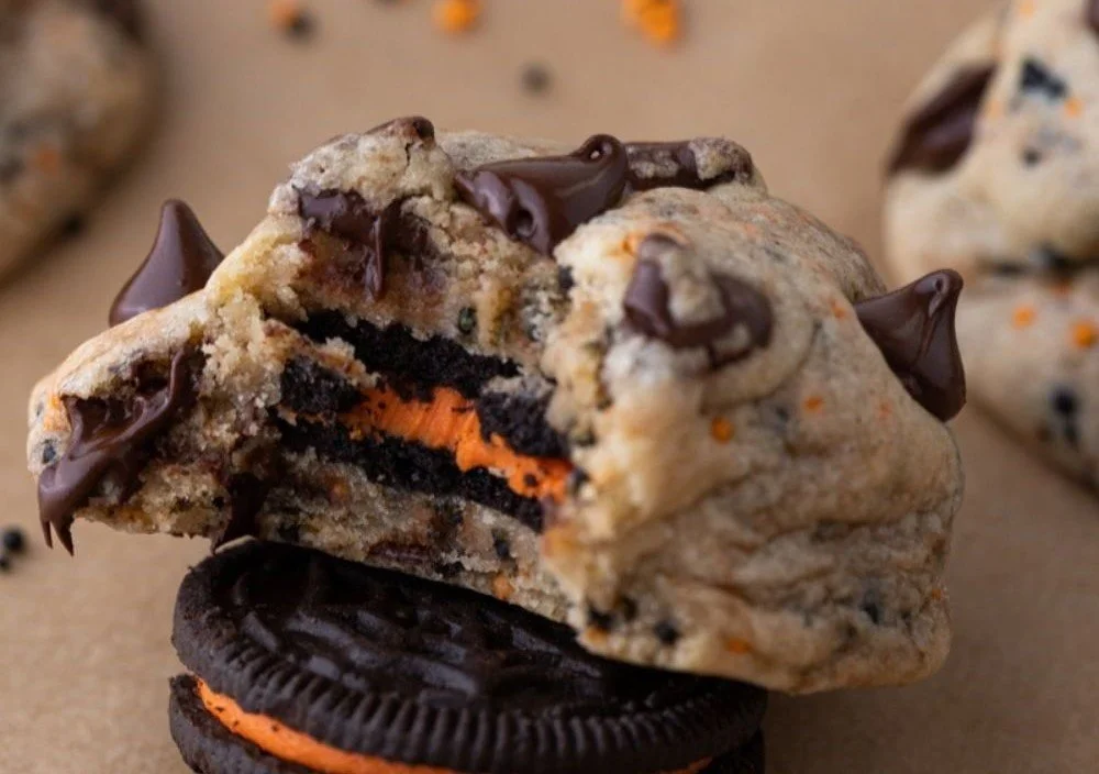 Halloween-themed Oreo-Stuffed Chocolate Chip Cookies with festive decorations.