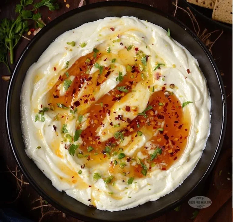Honey-dipped whipped feta served with crackers and fruits