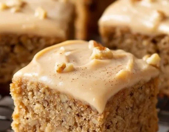 Delicious banana bread brownies displayed on a wooden table