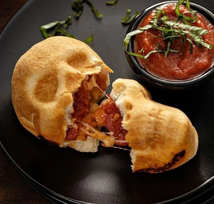 Halloween Pizza Skulls recipe, perfect spooky themed food for parties
