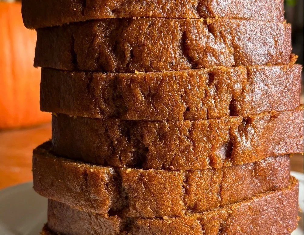 Delicious homemade Pumpkin Loaf in a rustic setting, perfect for coffee moments