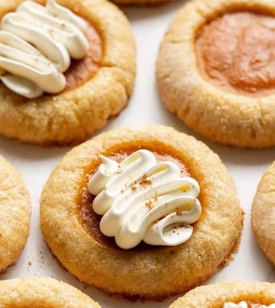 Thick chewy pumpkin pie cookies topped with pumpkin spice flavors